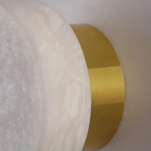 Kelvi Minimalist Round Alabaster Wall Sconce - Lumovique