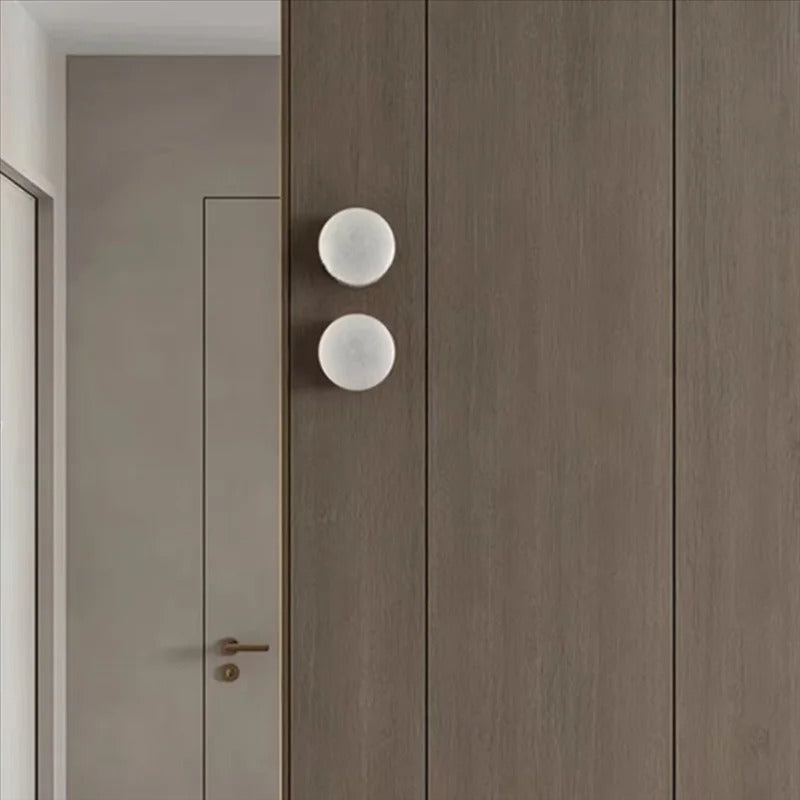 Kelvi Minimalist Round Alabaster Wall Sconce - Lumovique