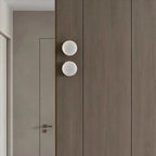 Kelvi Minimalist Round Alabaster Wall Sconce - Lumovique